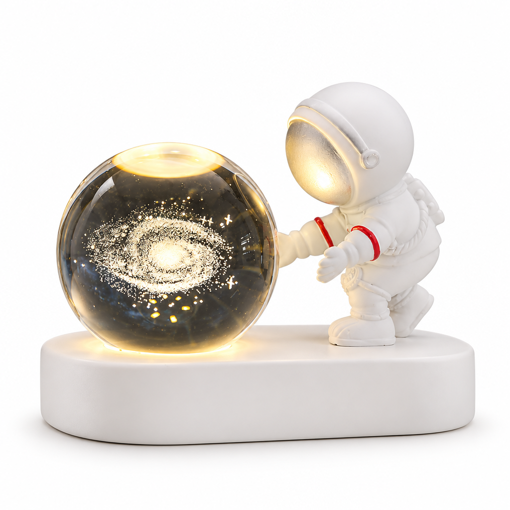 Lámpara esfera galaxia con astronauta encendida